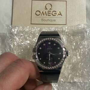 Omega Purple Dial Watch with Silver Accents